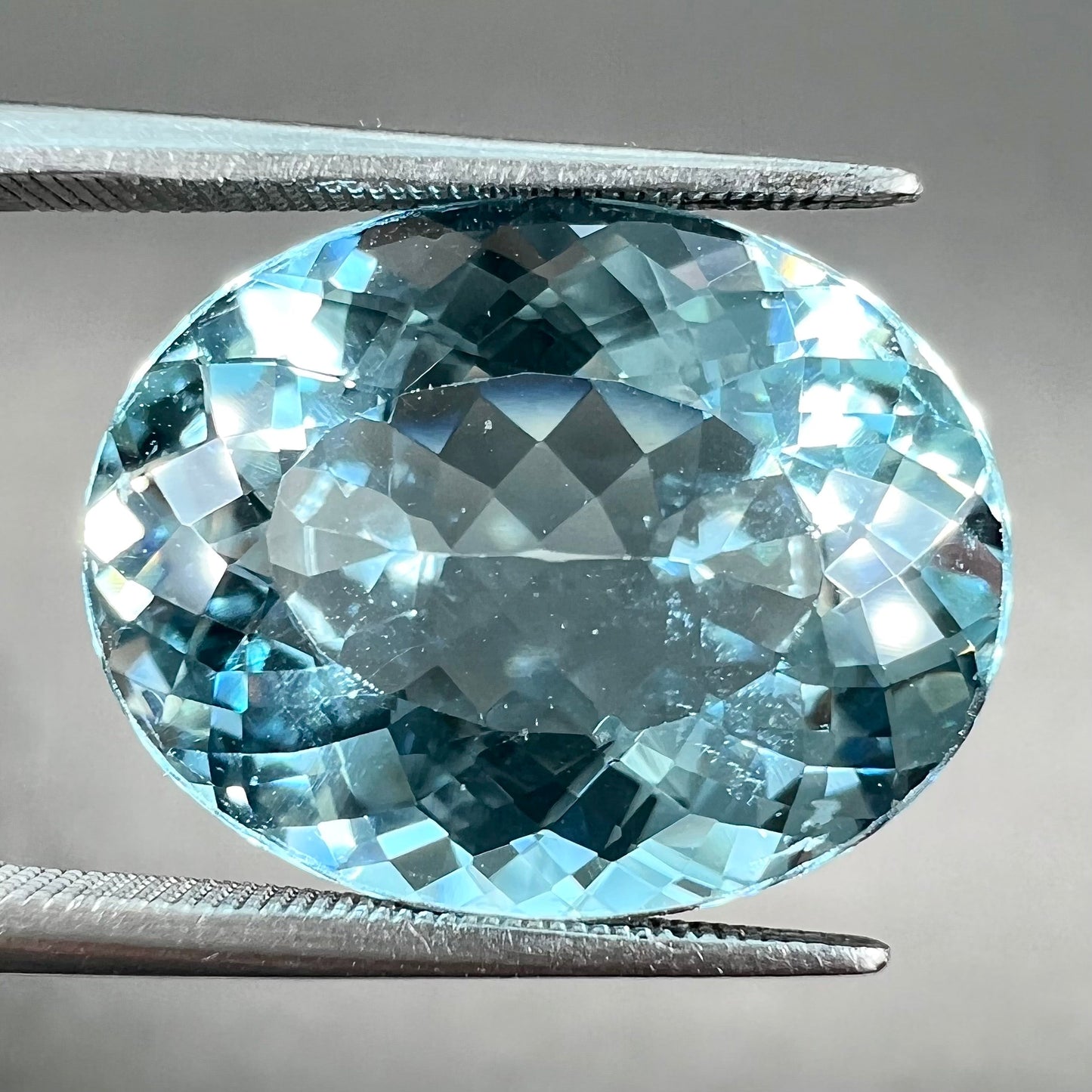 A loose, AAA grade, oval cut aquamarine stone from Brazil.