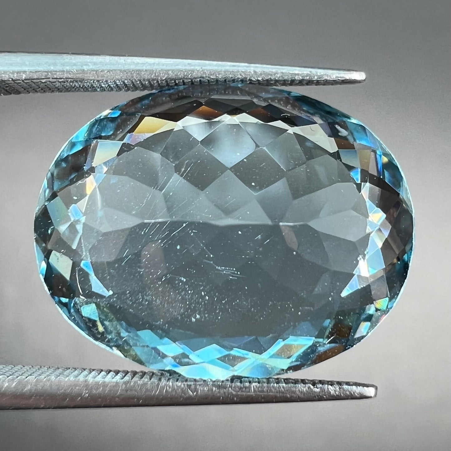 A loose, AAA grade, oval cut aquamarine stone from Brazil.