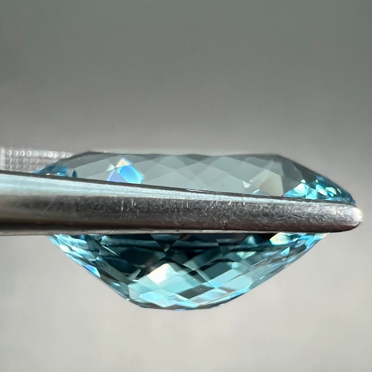 A loose, AAA grade, oval cut aquamarine stone from Brazil.