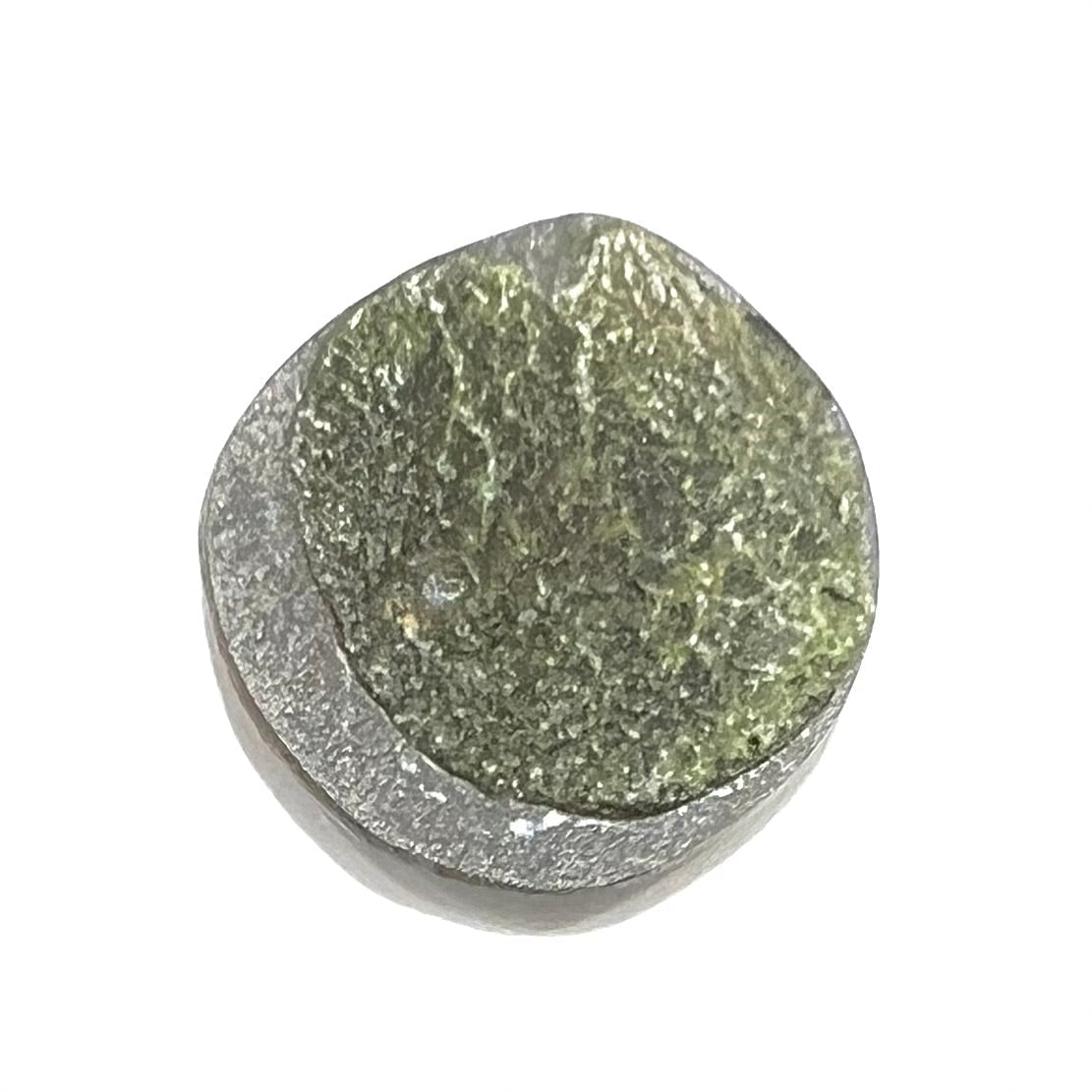 A round cabochon cut Tyrone turquoise stone from New Mexico. The stone is blue with brown, gray, and black matrix.