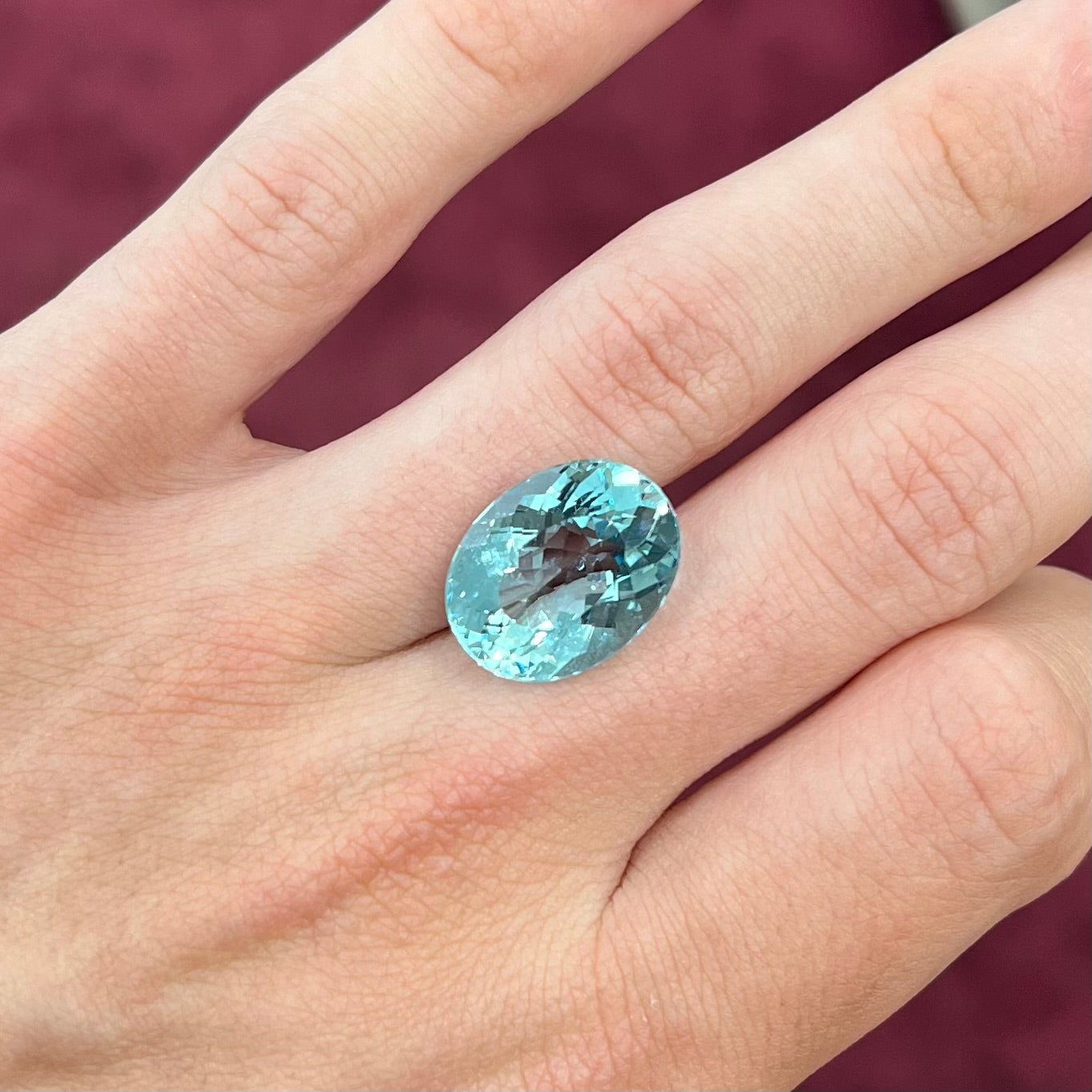 A loose, AAA grade, oval cut aquamarine stone from Brazil.