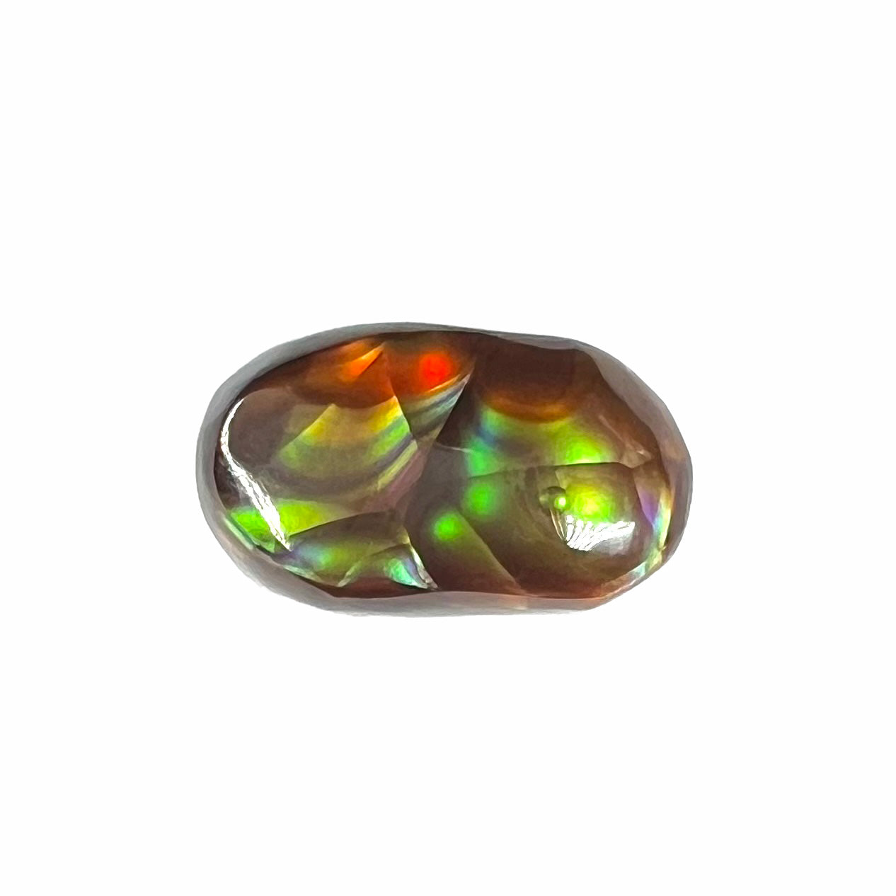 A loose, oval cabochon cut Mexican fire agate stone. The stone has multi-colored banding with blue overtones.