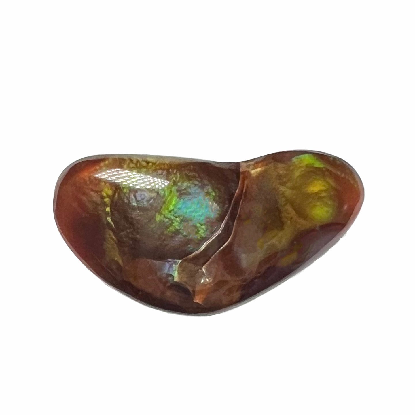 A loose, boomerang shaped fire agate cabochon.  The stone displays greens, purples, blues, and reds.