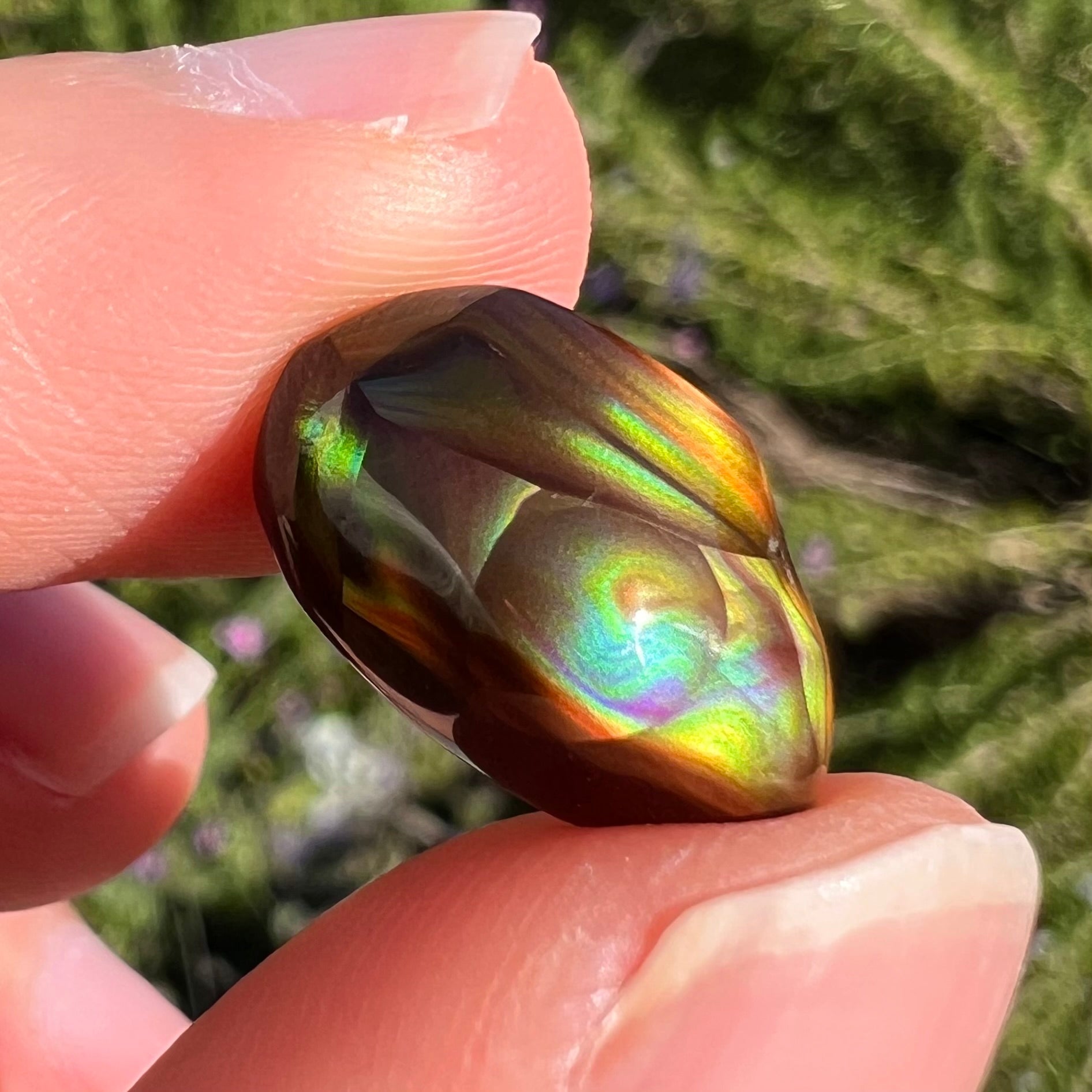 A loose, gem grade Mexican fire agate stone.  The stone is finely banded and ice blue green color.