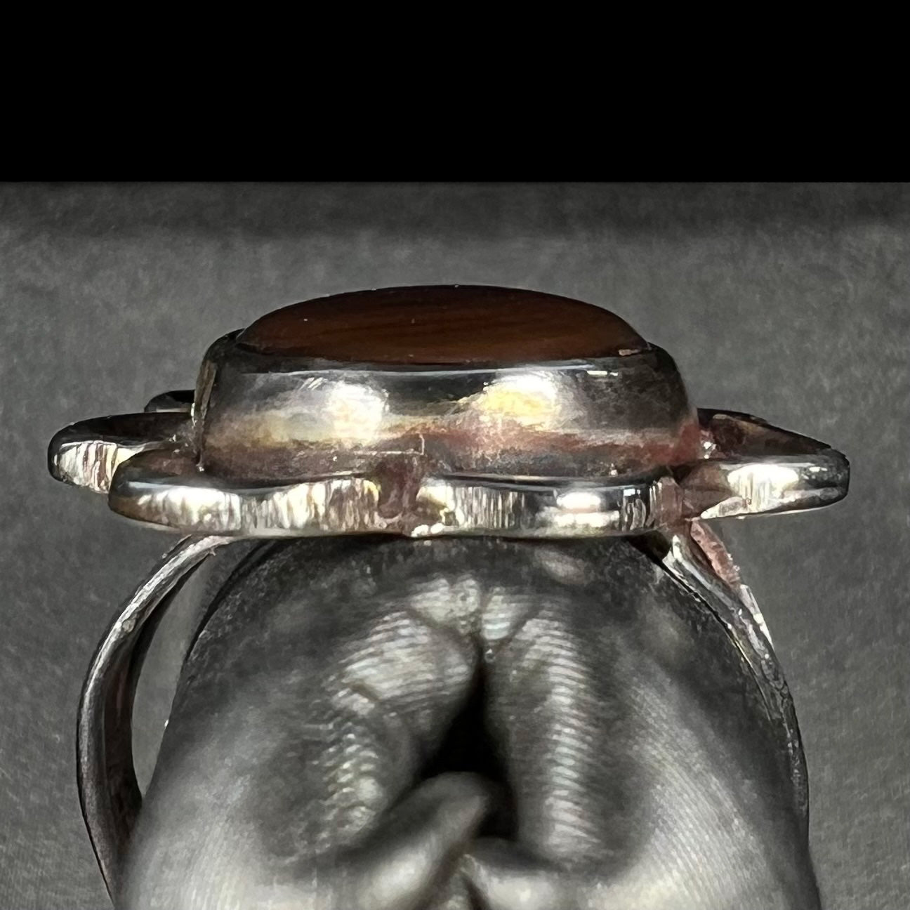 Gallery view of handmade fire agate ring with bent shank detail.