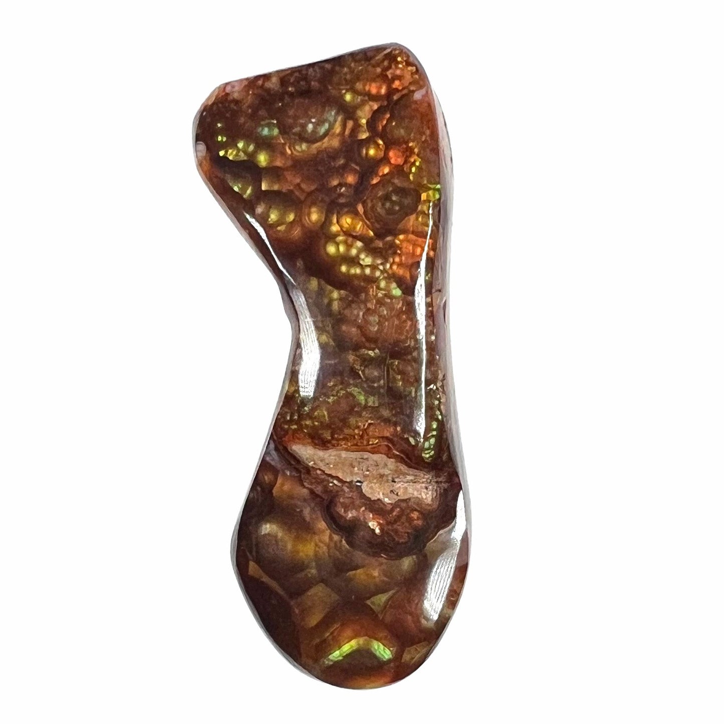 A loose, freeform cabochon cut fire agate gemstone. The stone exhibits a bubbly pattern.