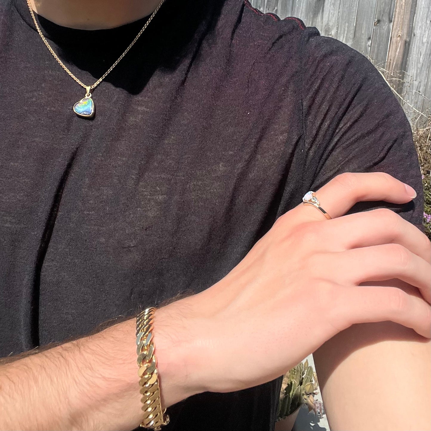 A vintage Blach Hills gold ring mounted with a marquise cut lab created opal.