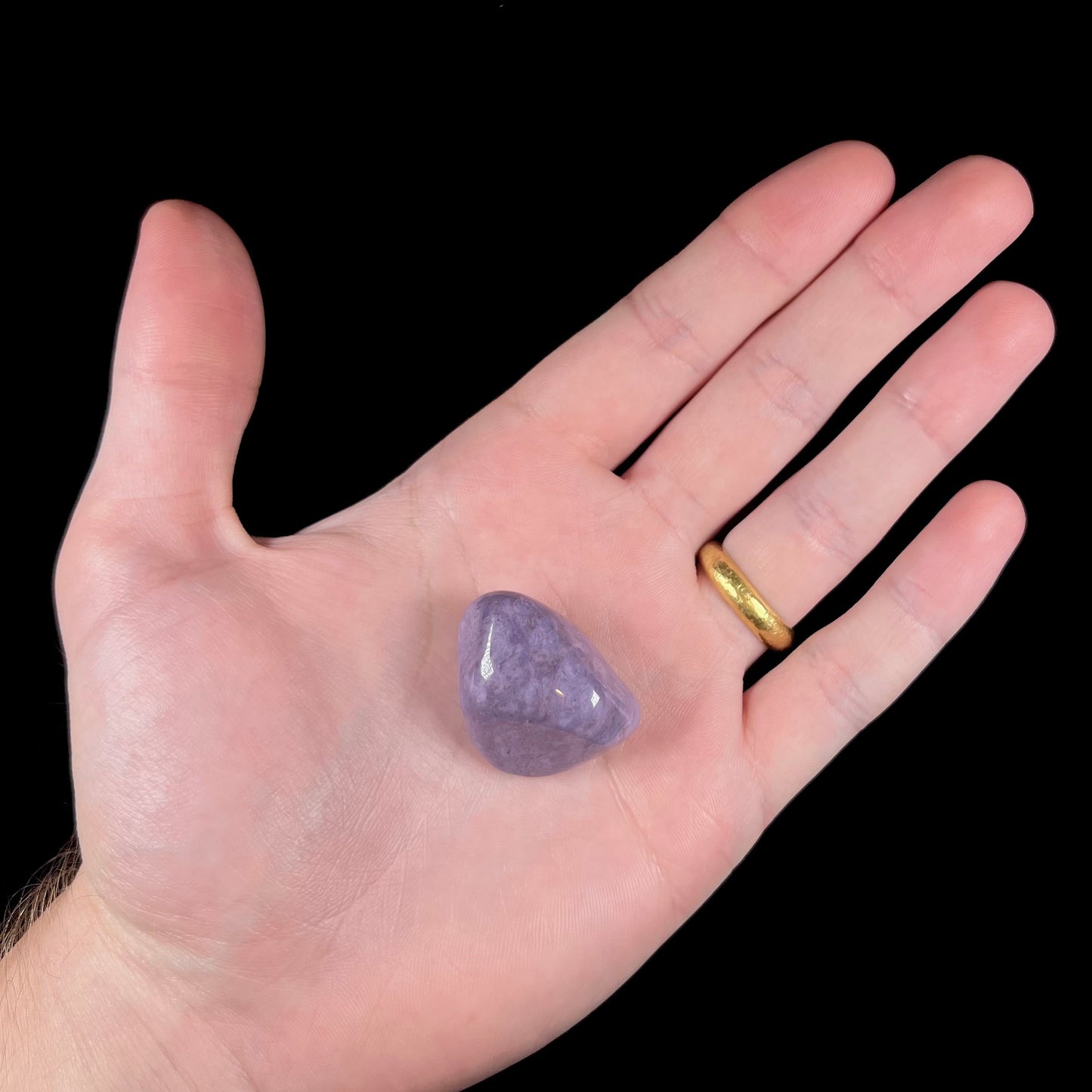 A tumble polished piece of Turkish purple jade, known as "Turkiyenite."