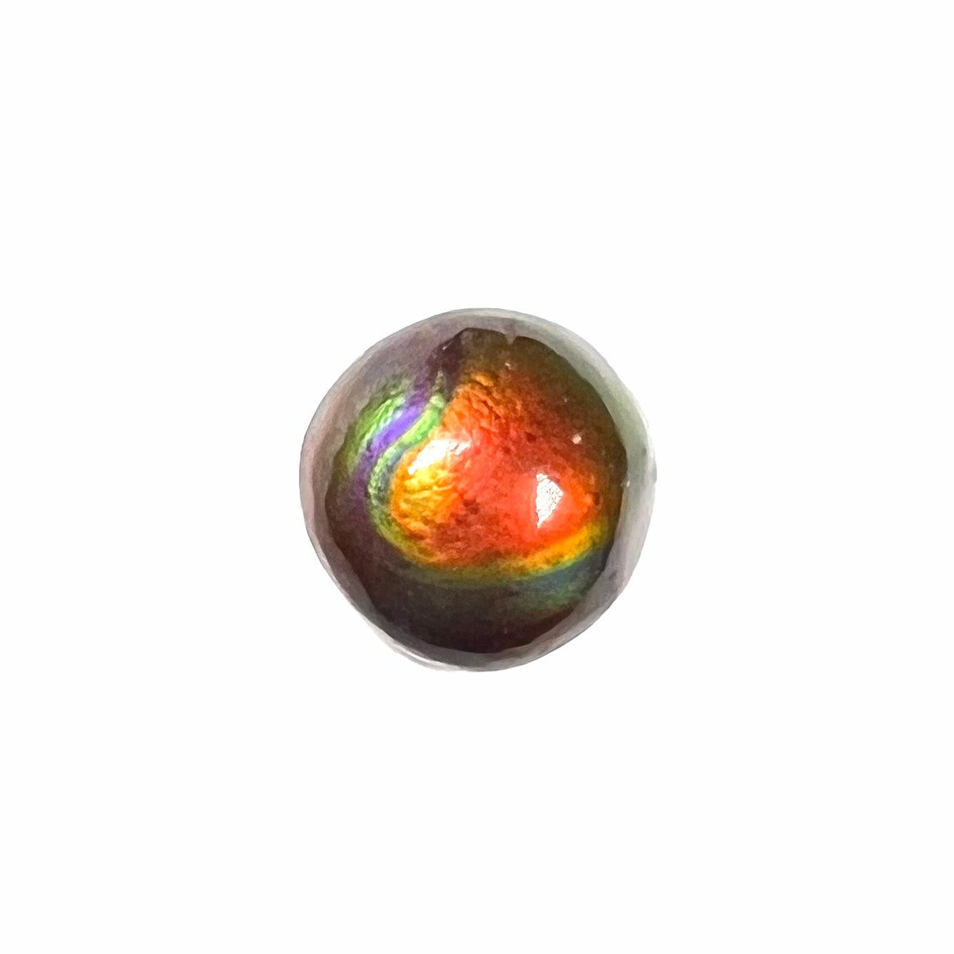 A 1.69ct round cabochon cut Mexican fire agate stone.  The stone is red with purple and green swirls.