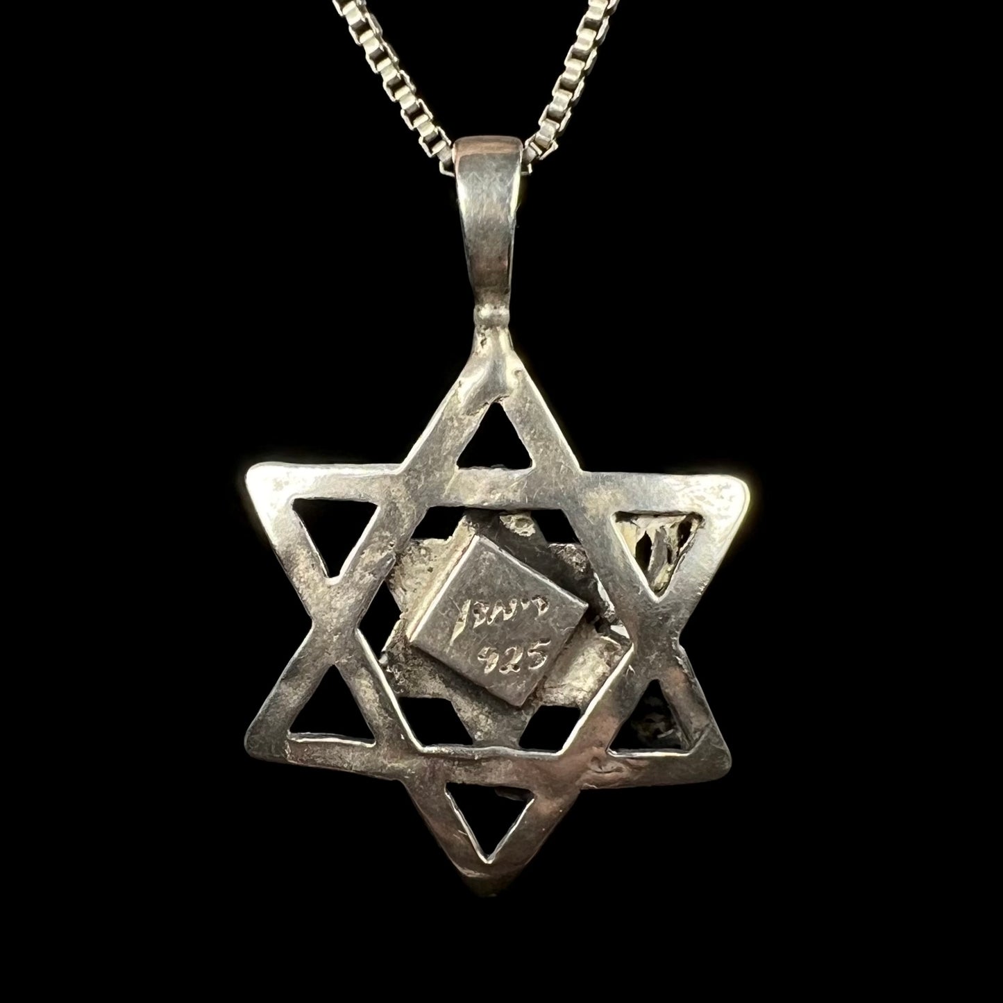 The back view of a sterling silver Star of David necklace made in Israel.