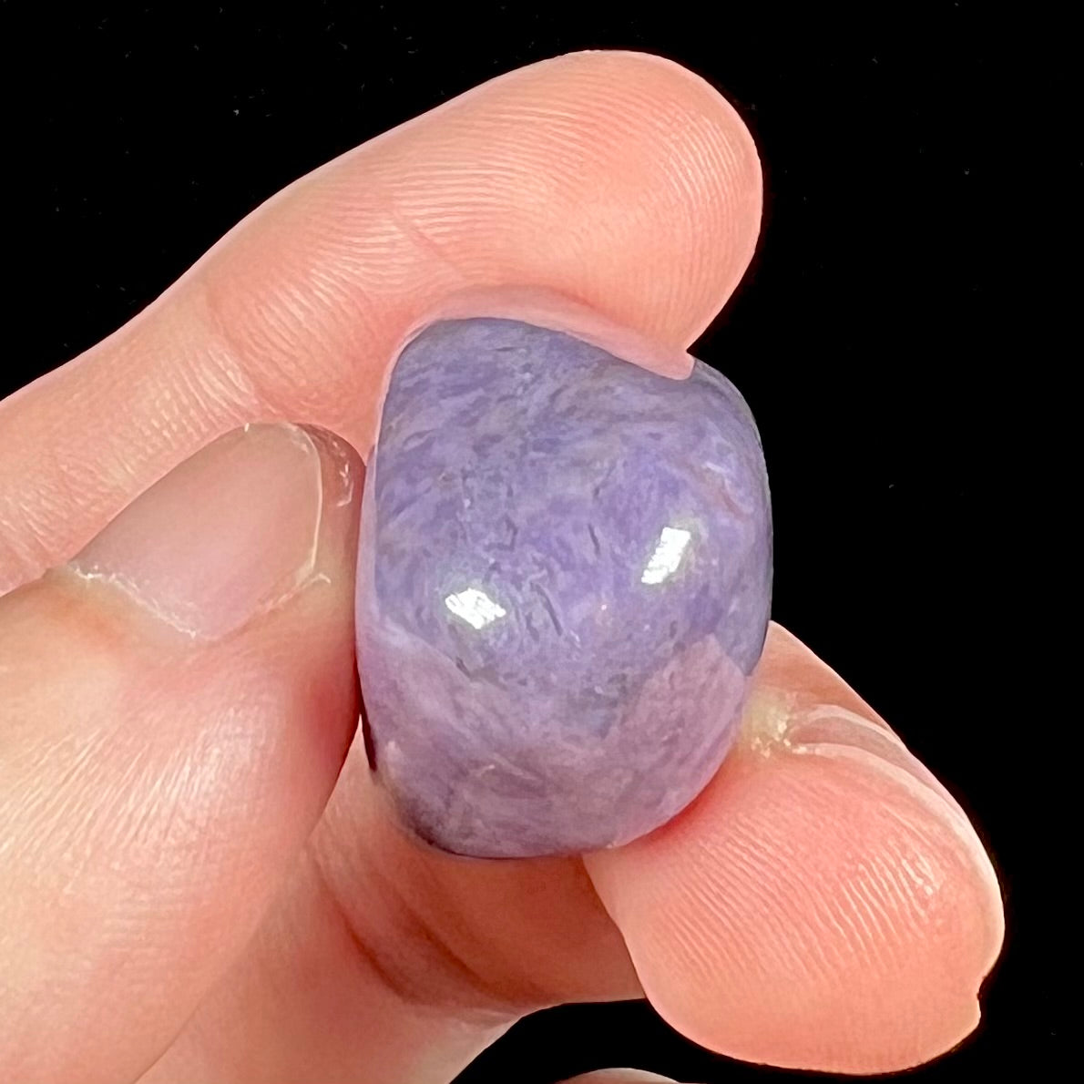 A tumble polished piece of Turkish purple jade, known as "Turkiyenite."
