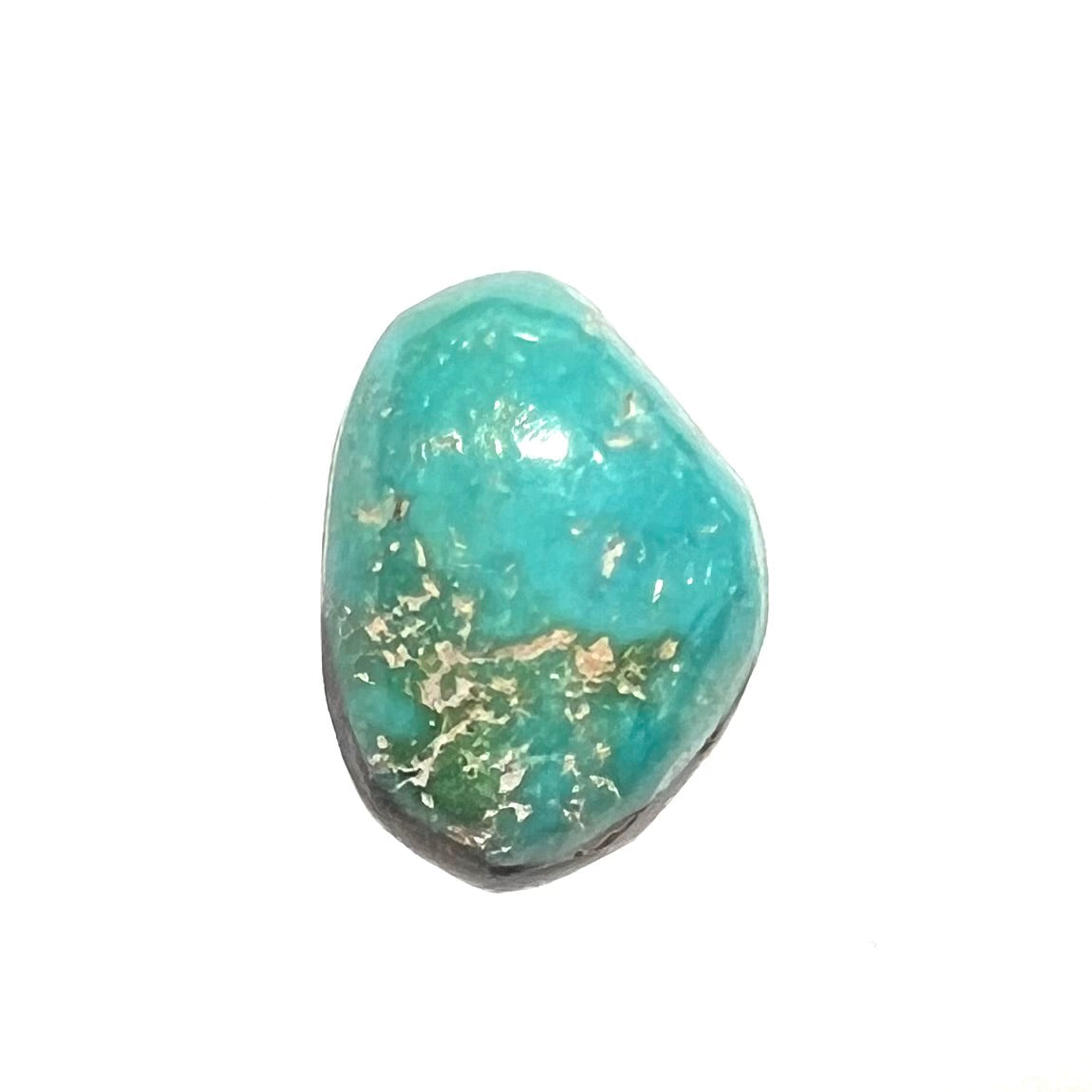 A loose, freeform cut Pilot Mountain turquoise cabochon. The stone is greenish blue.