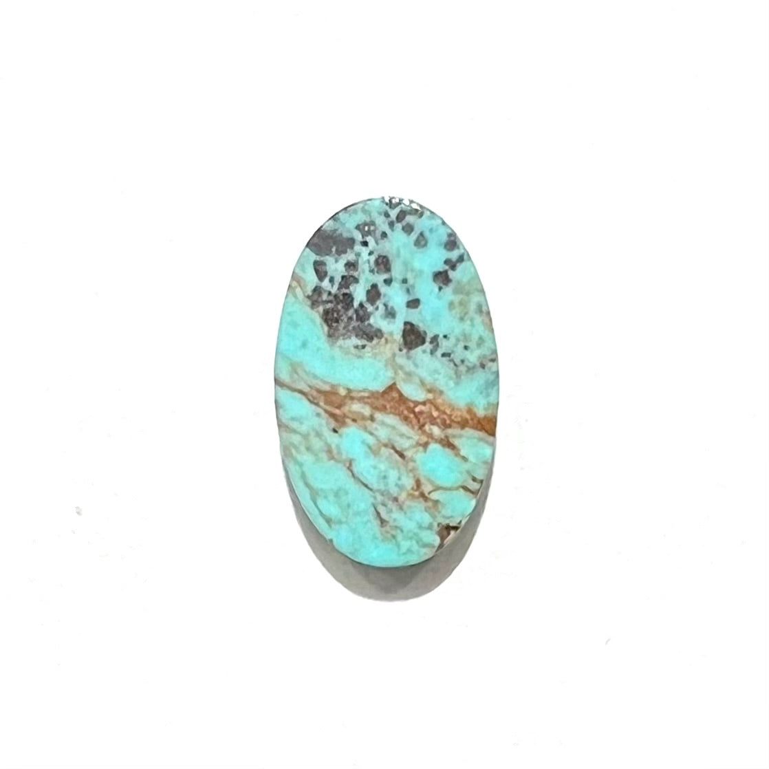 A loose, speckled, oval cabochon cut Valley Blue turquoise stone from Lander County, Nevada.