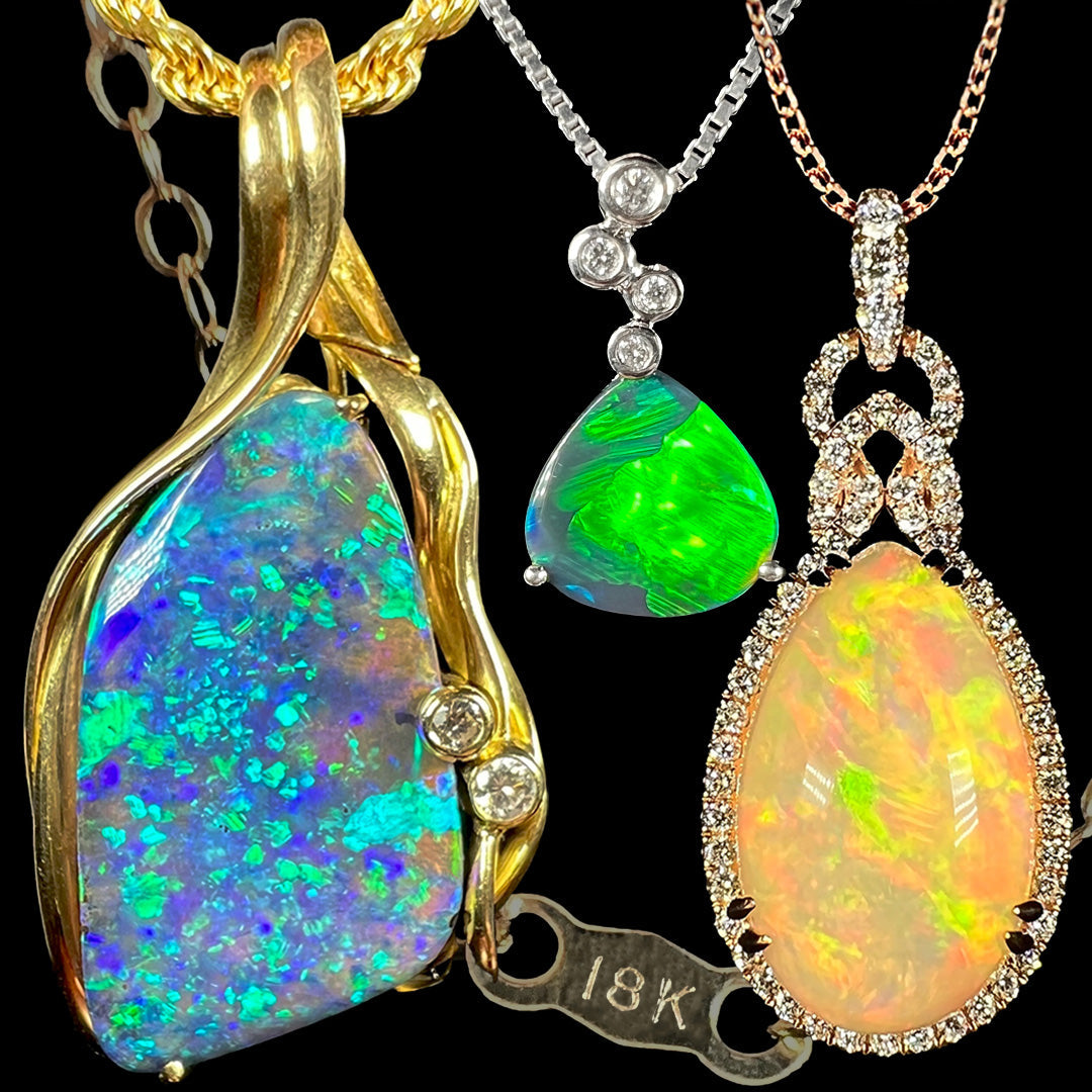 Three opal necklaces in 18k yellow, white, and rose gold in front of a gold chain's tag stamped "18K".