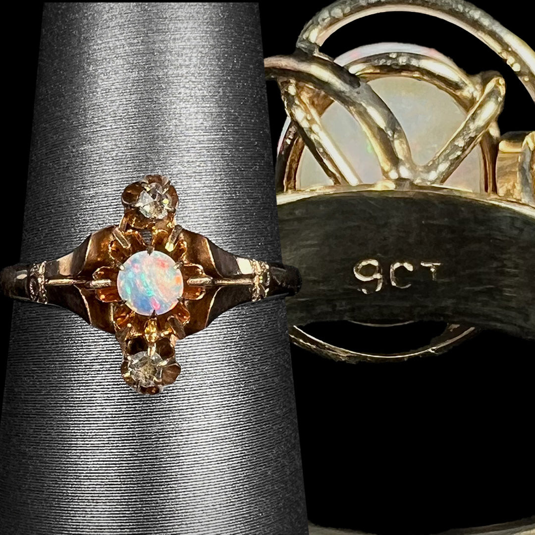 An antique English 9k gold opal and rose cut diamond ring on ring display next to faded gold opal ring showing "9CT" hallmark stamp.