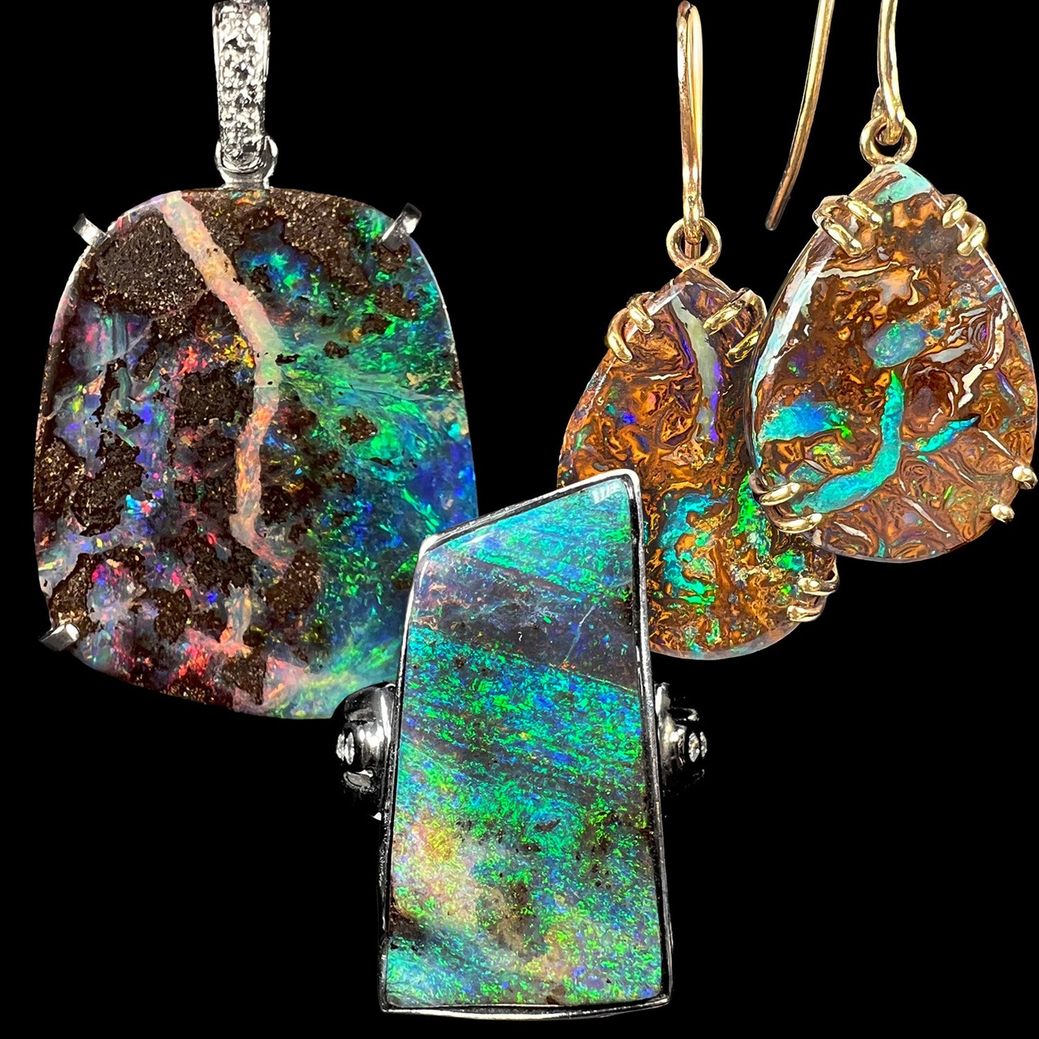 A set of Australian boulder opal jewelry showing a ring in front of a pendant and earrings.