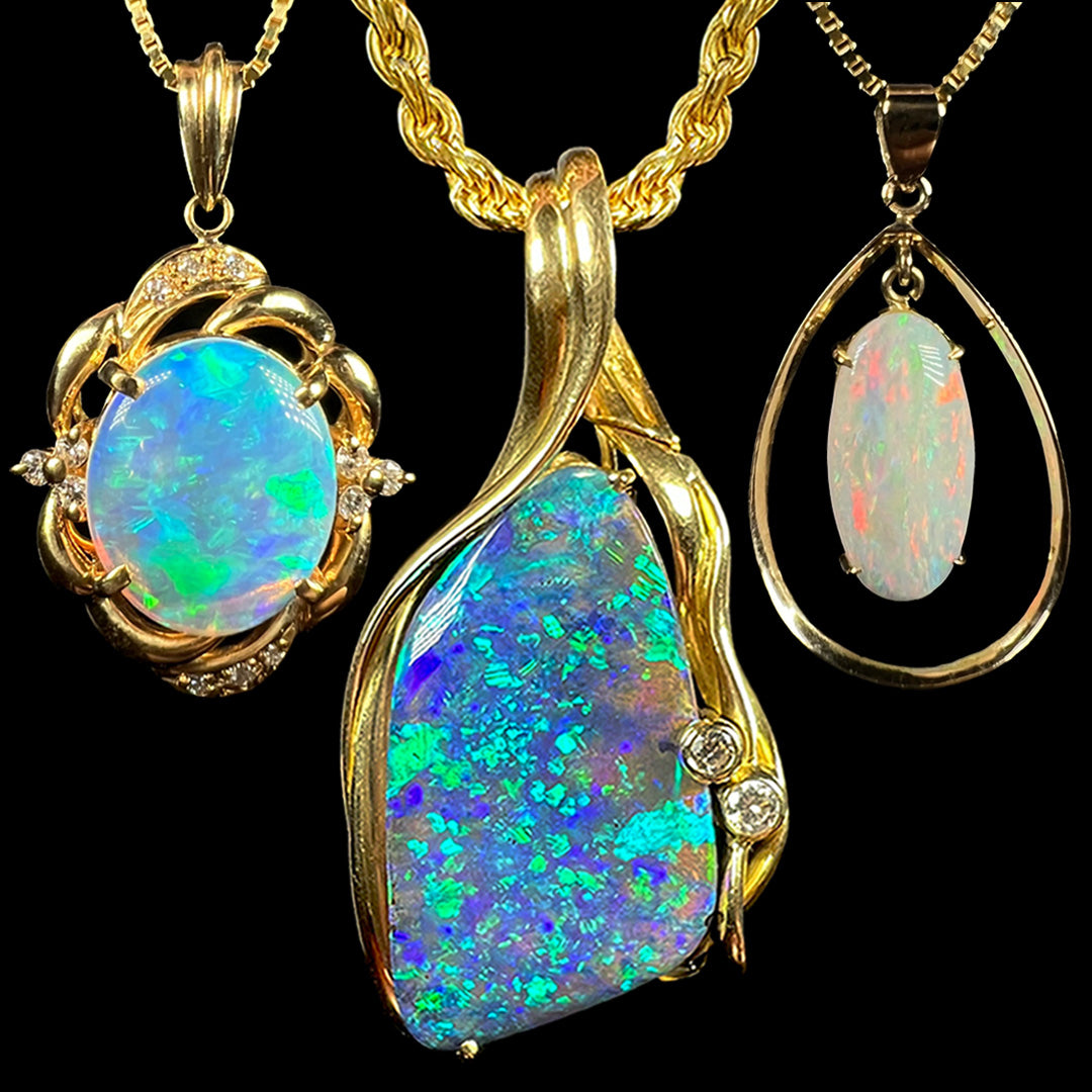 Three yellow gold Australian opal necklaces against black background. From left to right, a crystal opal, boulder opal, and white opal.