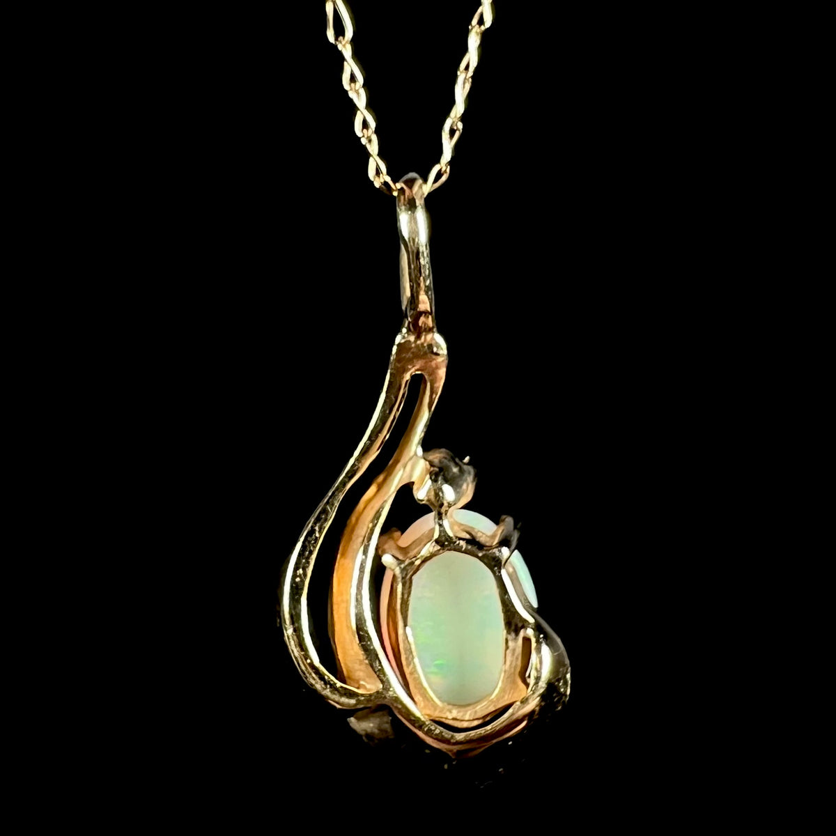 Back side of 14k yellow gold Australian opal pendant on chain