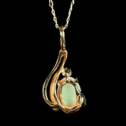 Back side of 14k yellow gold Australian opal pendant on chain