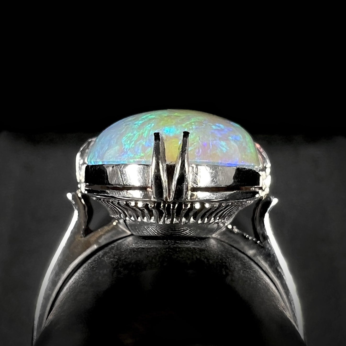 The gallery view of a 1950's-era platinum opal solitaire ring.