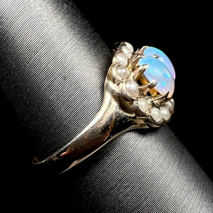 9k gold Victorian opal and pearl ring shown from side, focusing on ring's shank