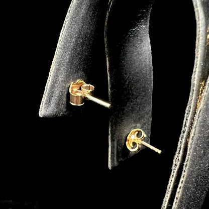 Back view of earring display with 9k gold push-back earring backs and posts