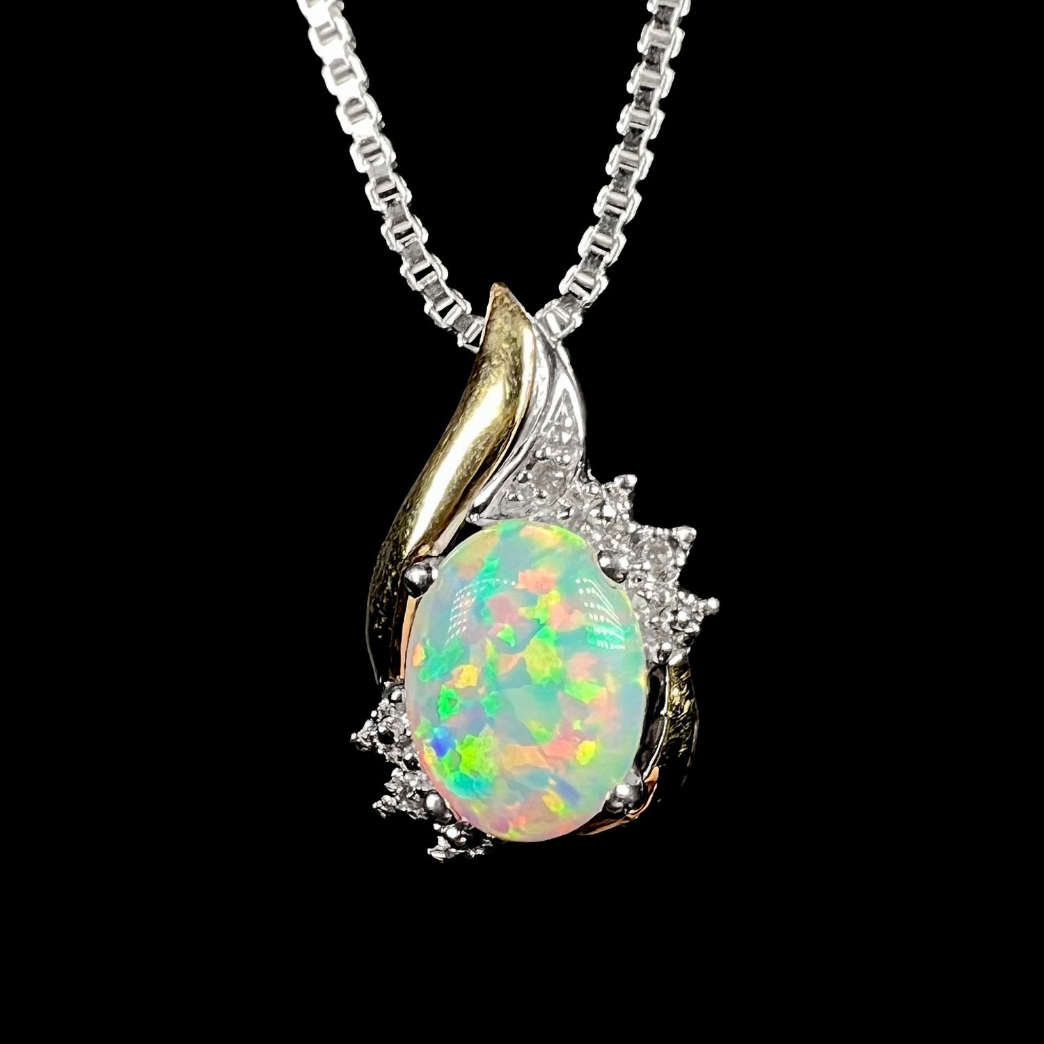 Two-tone sterling silver and 10k gold lab-created opal and diamond-accented necklace by Alwand Vahan, shown from front view.