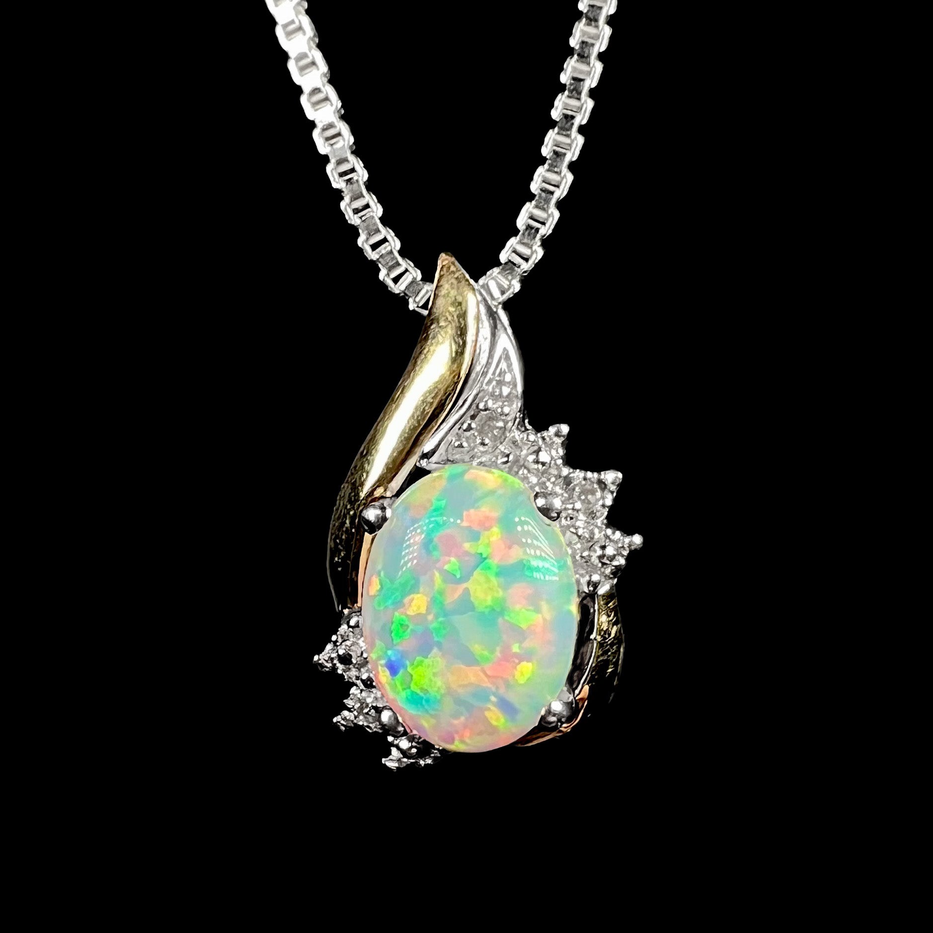 Two-tone sterling silver and 10k gold lab-created opal and diamond-accented necklace by Alwand Vahan, shown from front view.