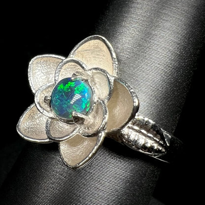 Australian black opal flower design solitaire ring on ring display