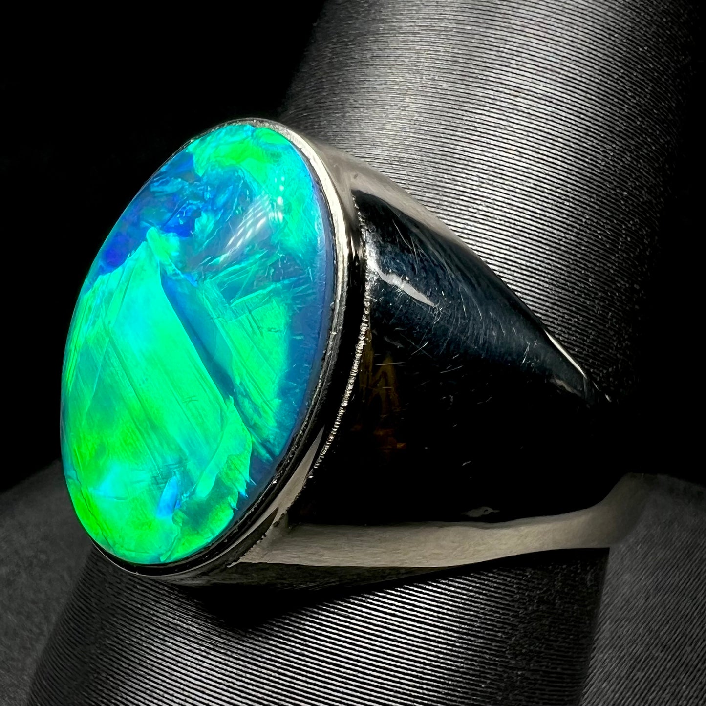 14k white gold Australian opal men's ring close-up on ring display