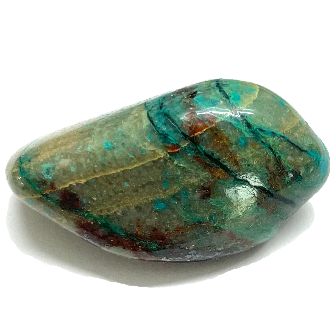 A quartz stone stained with green and blue chrysocolla.  Red cuprite stain inclusions can also be seen.