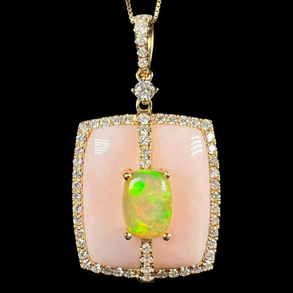 Close-up of Cirari brand women's 14k gold Ethiopian opal, Peruvian pink opal, and diamond halo necklace, shown against a black background.