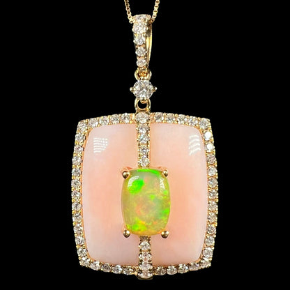 Close-up of Cirari brand women's 14k gold Ethiopian opal, Peruvian pink opal, and diamond halo necklace, shown against a black background.
