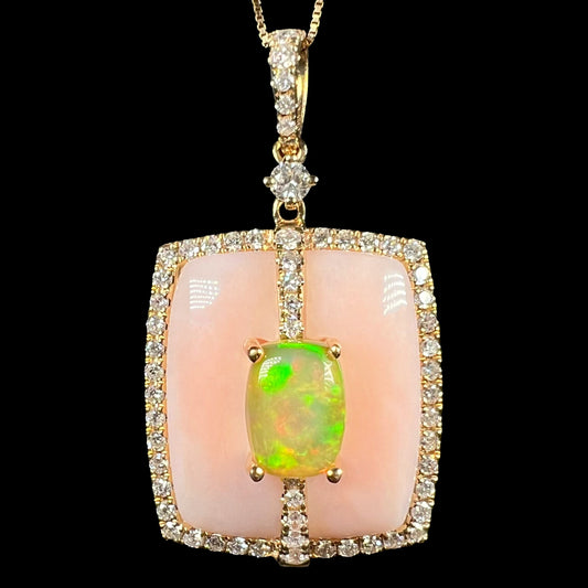Close-up of Cirari brand women's 14k gold Ethiopian opal, Peruvian pink opal, and diamond halo necklace, shown against a black background.