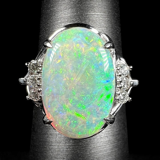 A Japanese-style platinum diamond ring set with a 2.54ct Coober Pedy opal.