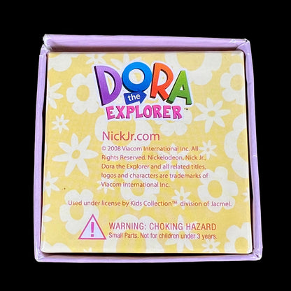 Back side of Dora the Explorer Fine Jewelry Collection necklace box showing Nick Jr. and Jacmel Kids Collection branding.