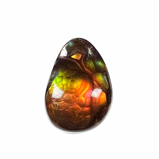 A loose, pear shaped fire agate stone from Northern Mexico.  The stone is red and green with blue banding.