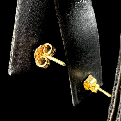 18k yellow gold friction back stud earrings, shown from the back view.