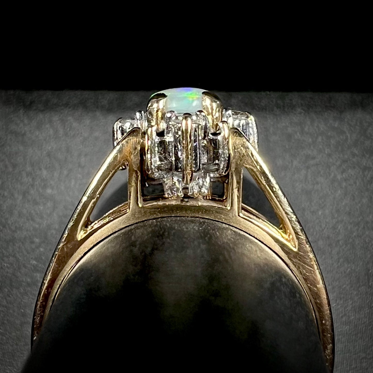 Side profile gallery view of reversible opal ring reveals ring's high profile design