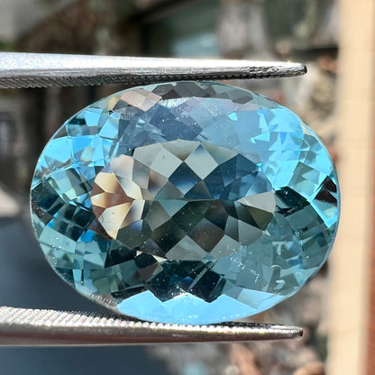 A loose, AAA grade, oval cut aquamarine stone from Brazil.