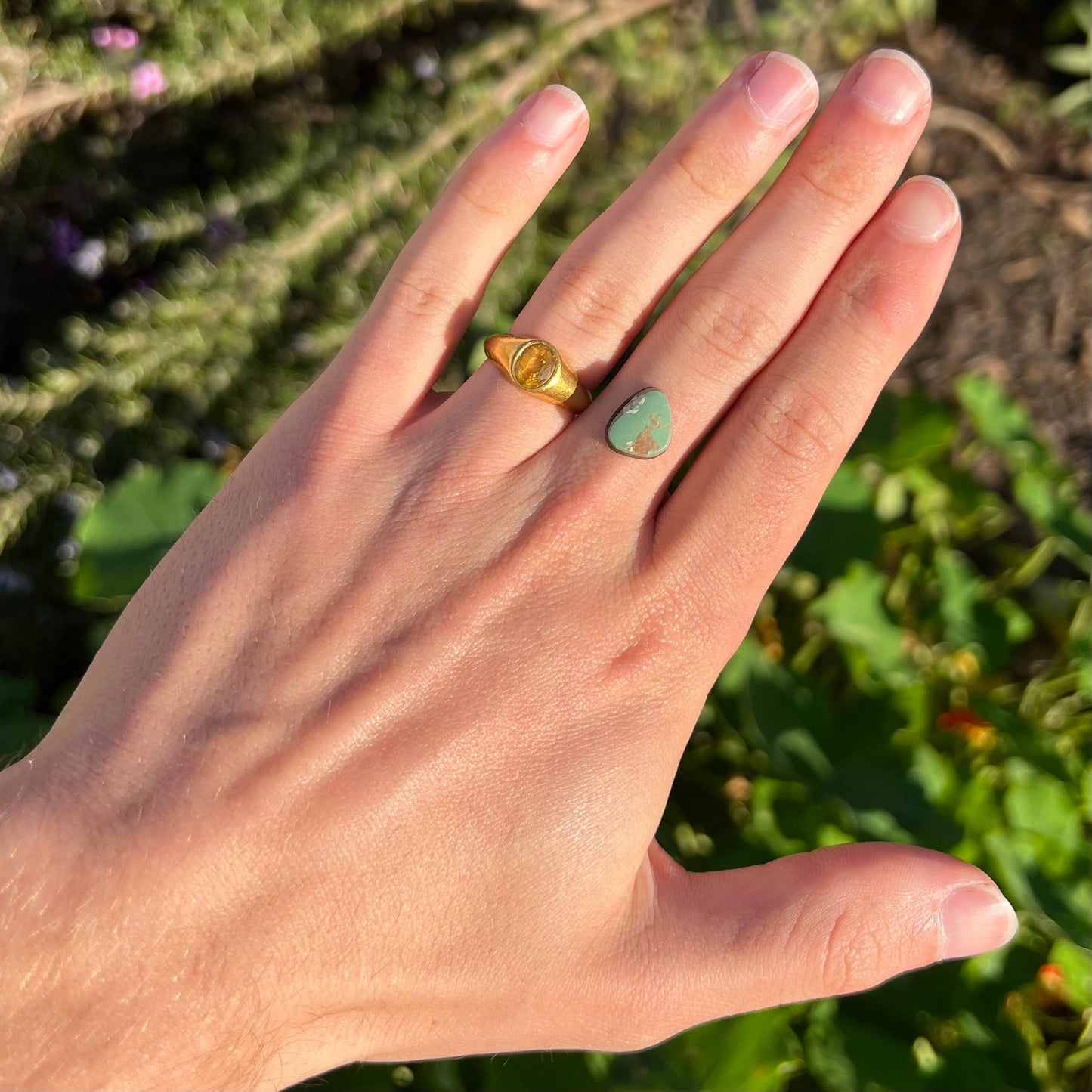 A loose, green Royston turquoise stone.  The stone has a brown matrix.