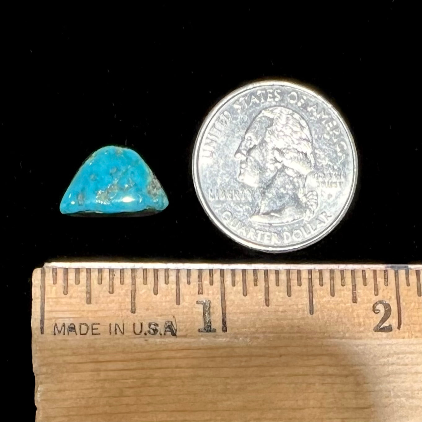 A loose, freeform turquoise cabochon stone from Kingman, Arizona.