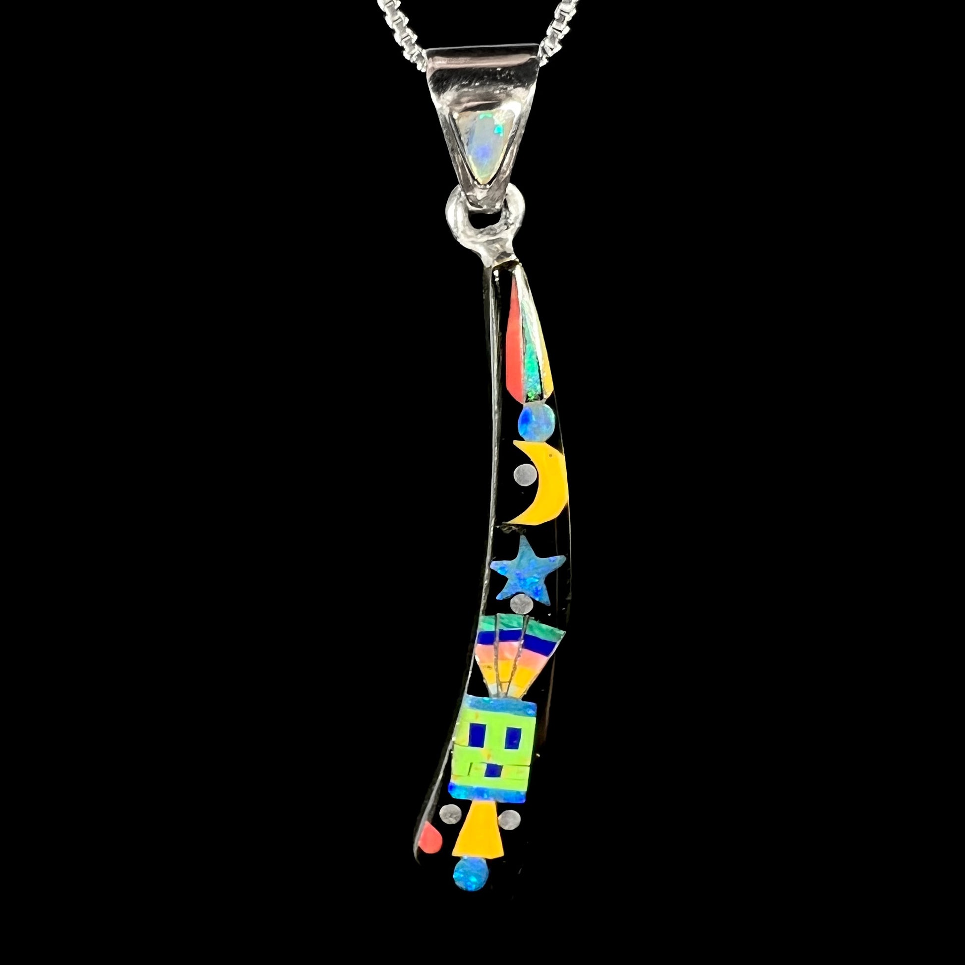 Men's elongated sterling silver opal and onyx inlay necklace with Southwest-style kachina and space motif, shown on black background.