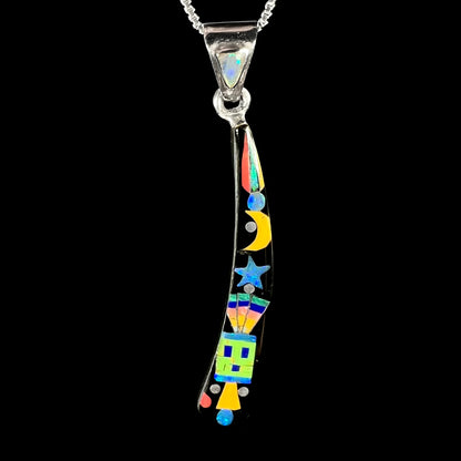 Men's elongated sterling silver opal and onyx inlay necklace with Southwest-style kachina and space motif, shown on black background.