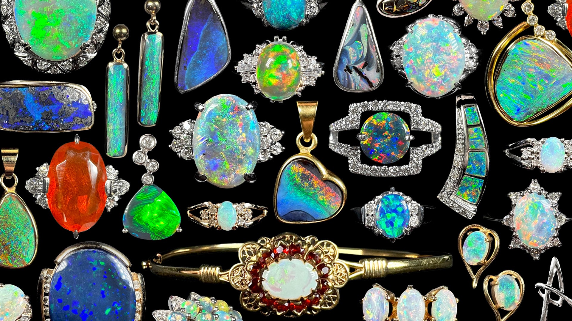 A colorful collection of OpalPop opal jewelry, featuring many different styles of opal rings, pendants, and earrings.