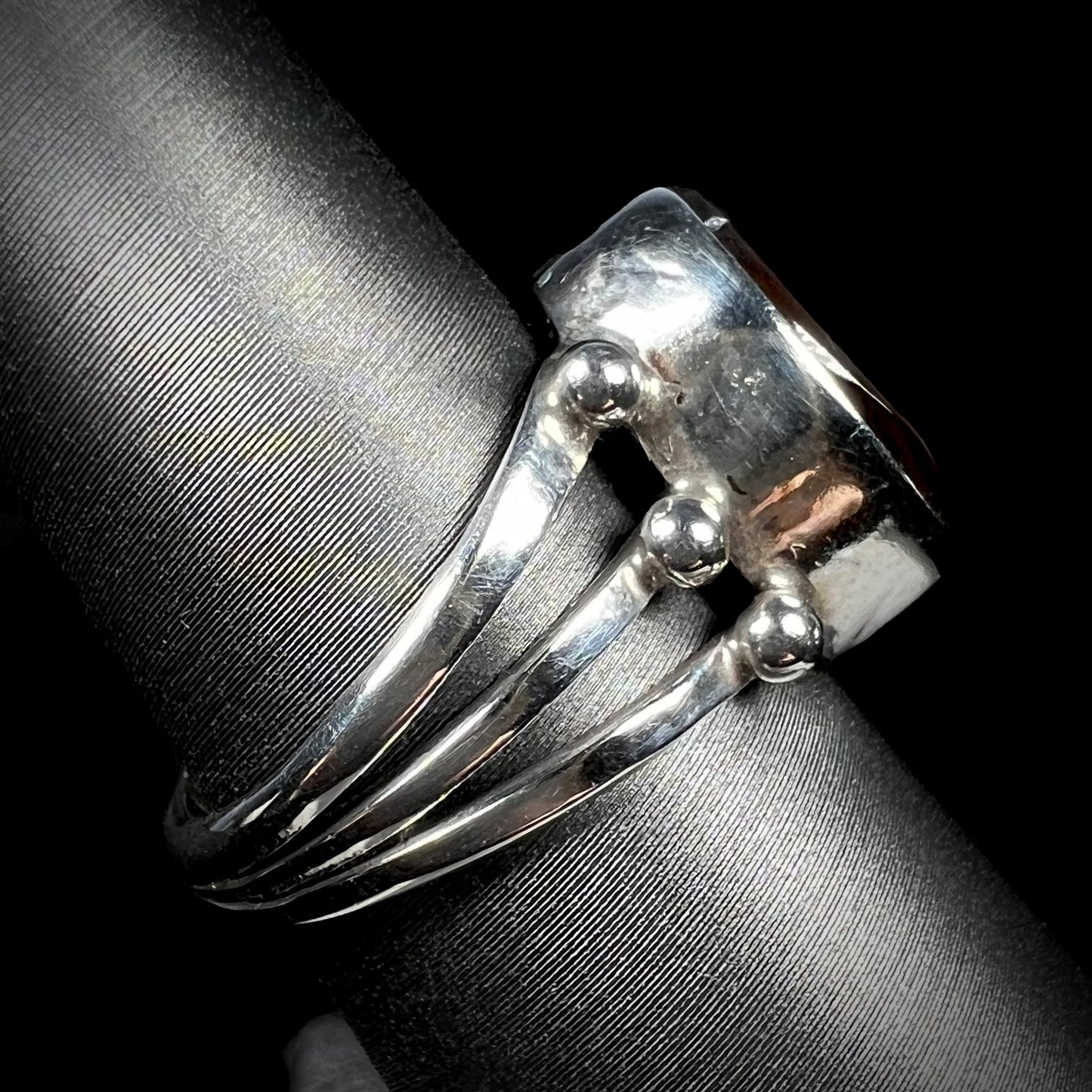 Opposite side view of the boho silver fire agate ring setting.