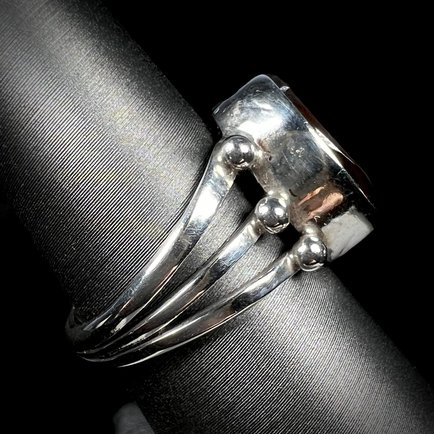 Opposite side view of the boho silver fire agate ring setting.