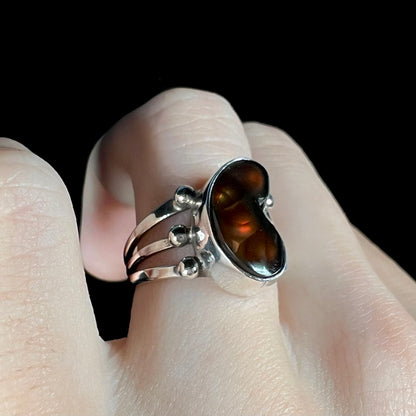 Opposite angle of ring showing faint reddish orange fire agate flash.