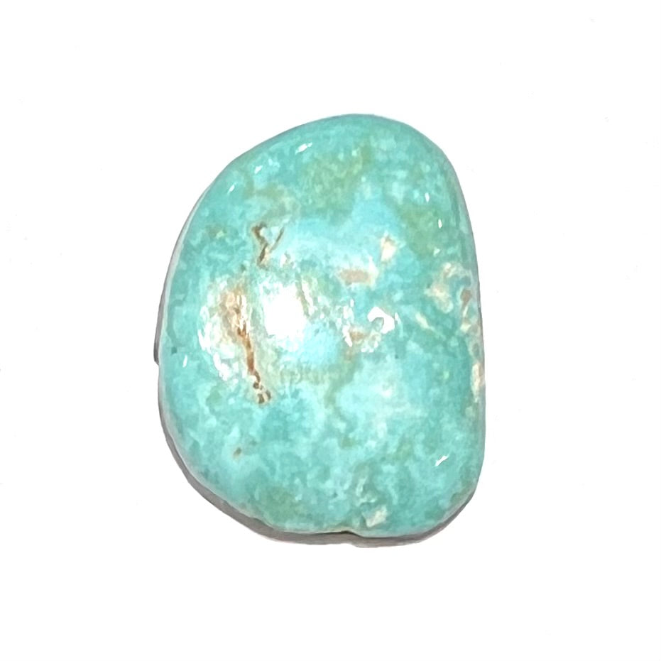 A backed, light bluish green Royston turquoise stone from Nevada.