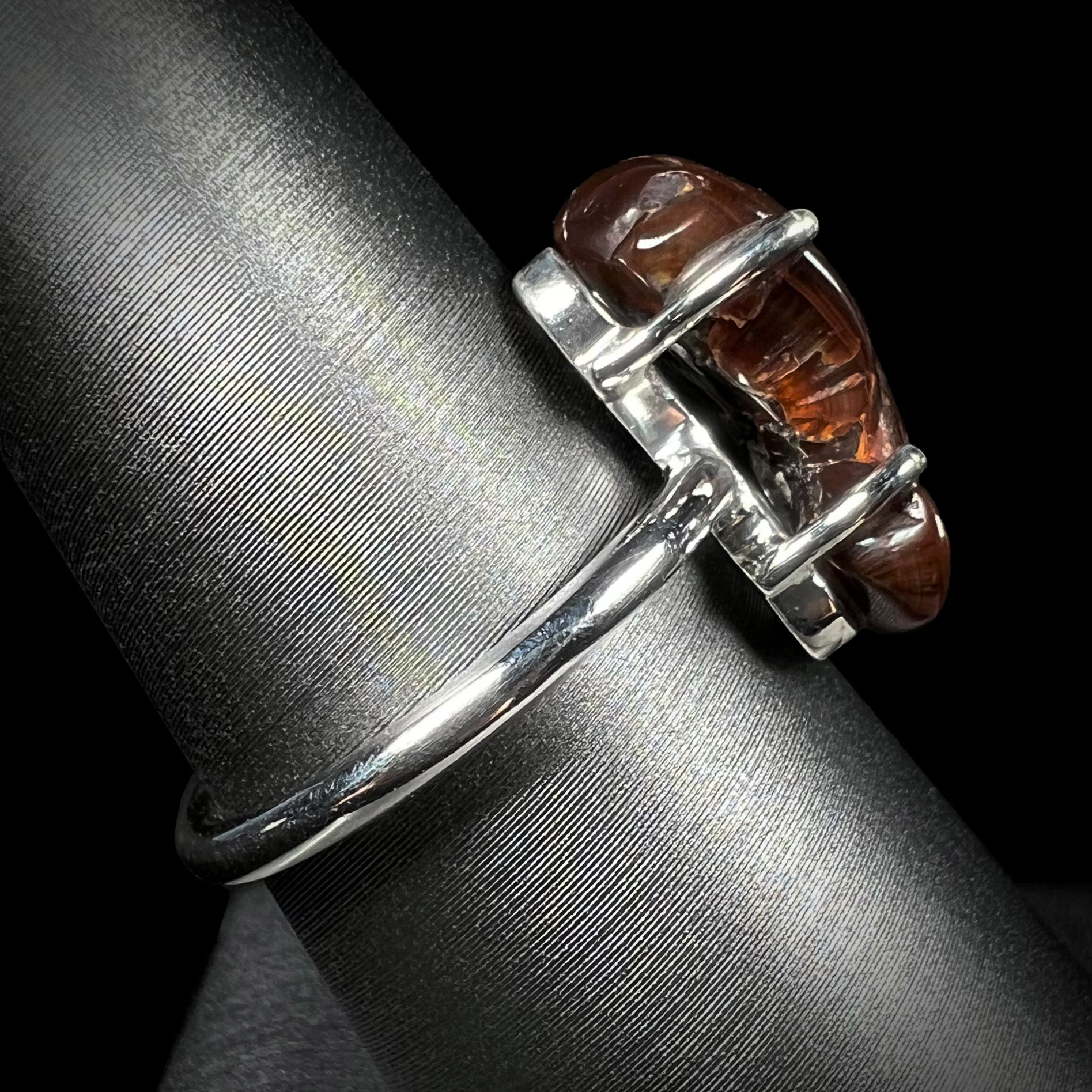 Opposite side profile of the Deer Creek fire agate ring showing brown tones.